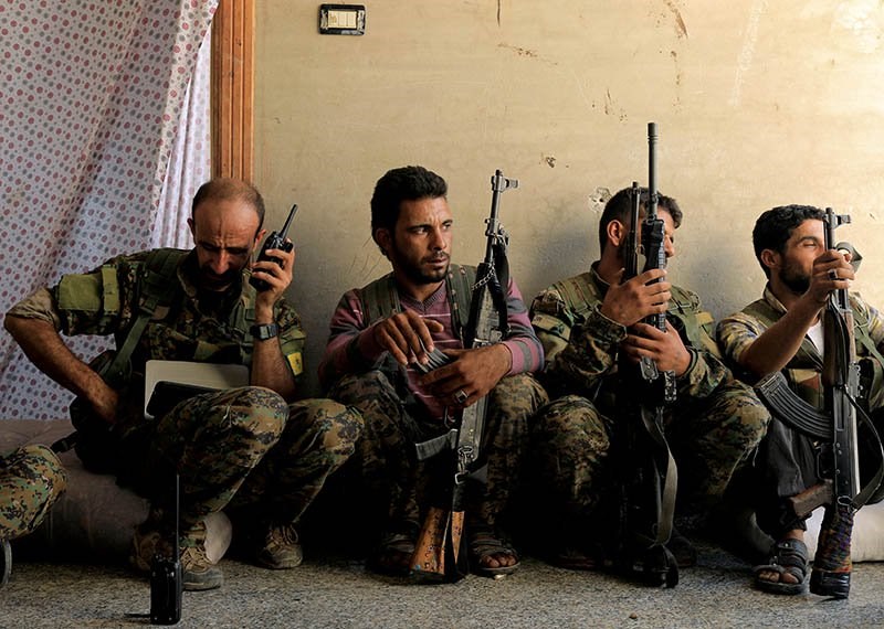 Các tay súng lực lượng nổi dậy Syria. Ảnh: REUTERS