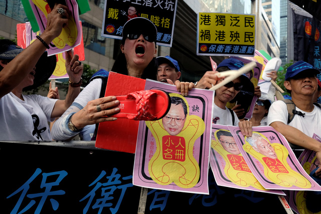 Lãnh đạo Hong Kong sợ dân chọc giận Bắc Kinh - Ảnh 2.